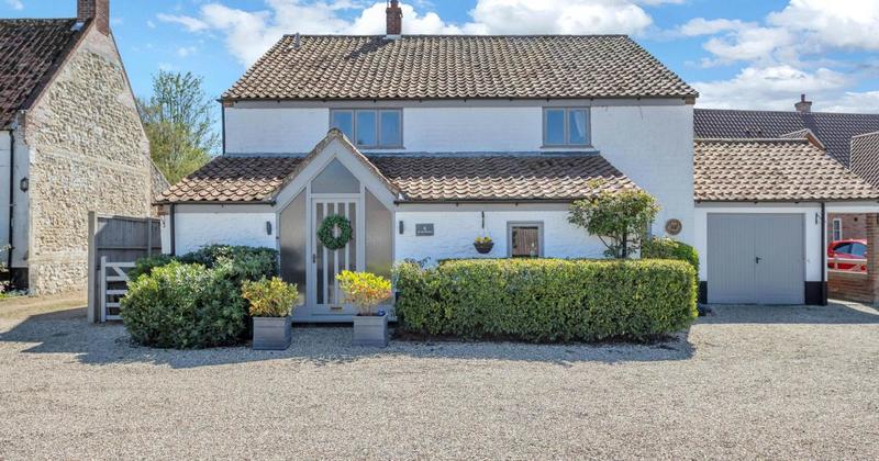 Period granary conversion with half an acre of gardens for sale