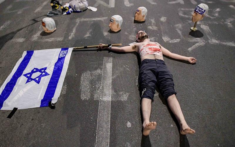 PM shares call for Shin Bet to arrest dozens over faux ‘severed heads’ protest display