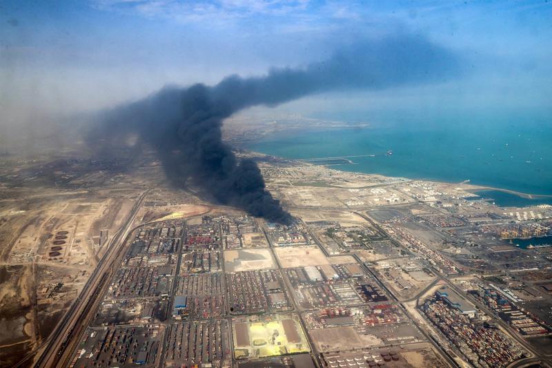 Iranian MP accuses Israel of involvement in port blast, as fires continue to smolder