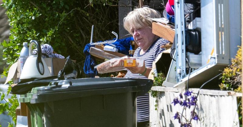 Woman told to clear mountain of rubbish from her front garden speaks out