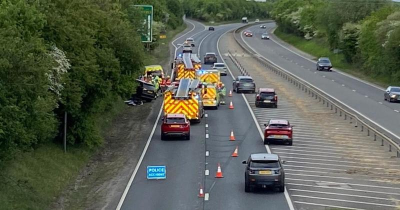 Emergency services block off A11 lane after SUV crash