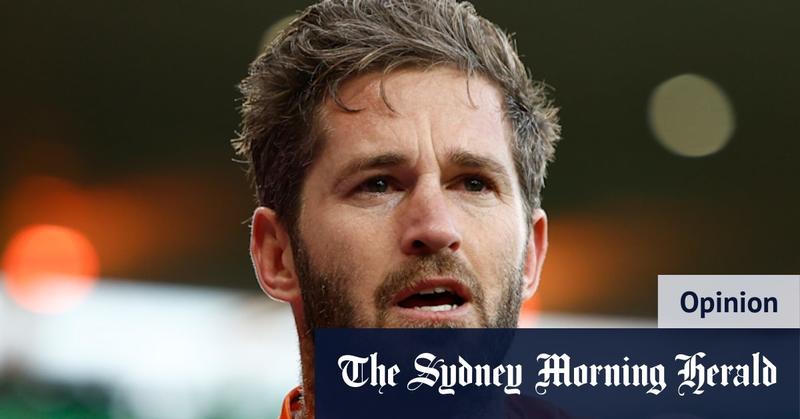 The footy kiss that said everything about an AFL warrior