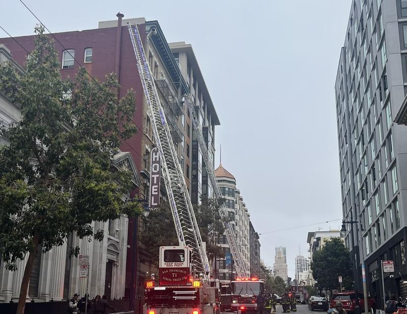2 people rescued from SF high-rise after scooter's battery catches fire