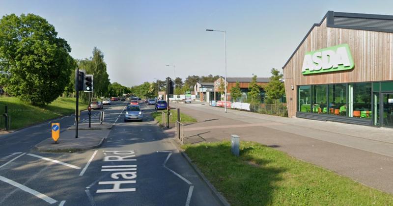 Car crashes into Asda traffic lights