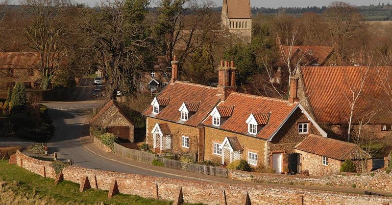 Villagers push to cut speed limit in half to stop cars flying through at 60mph