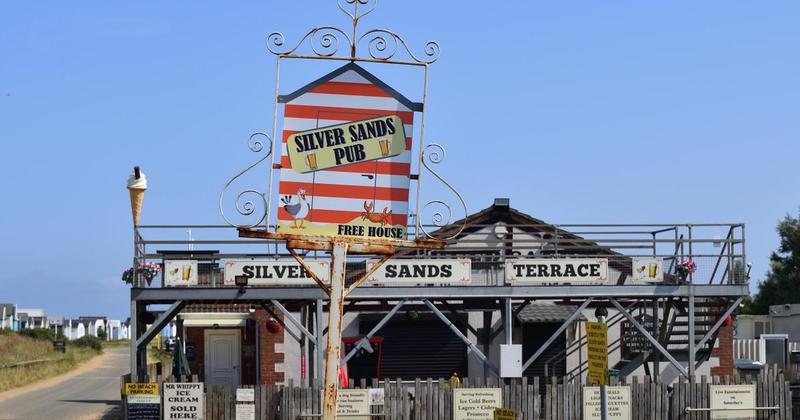 Beach pub's 'metal monstrosity' which angered locals could be cut down to size