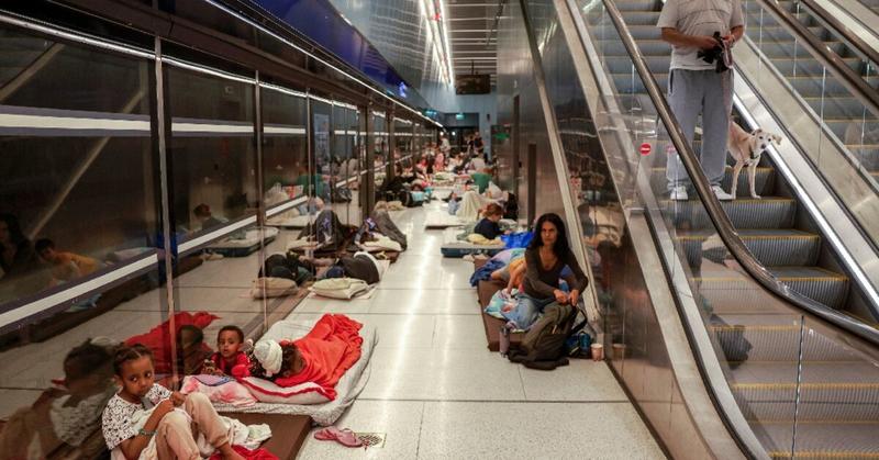 With missiles overhead, Tel Aviv residents huddle underground