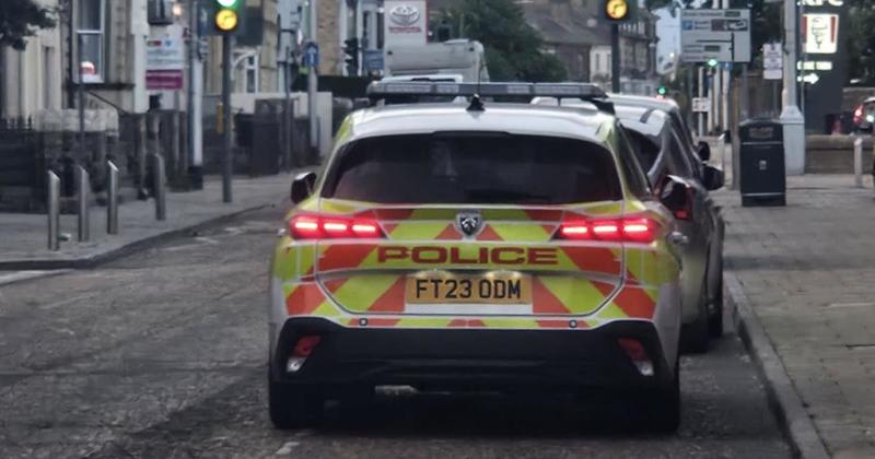 Wanted man arrested after police officers assaulted at address