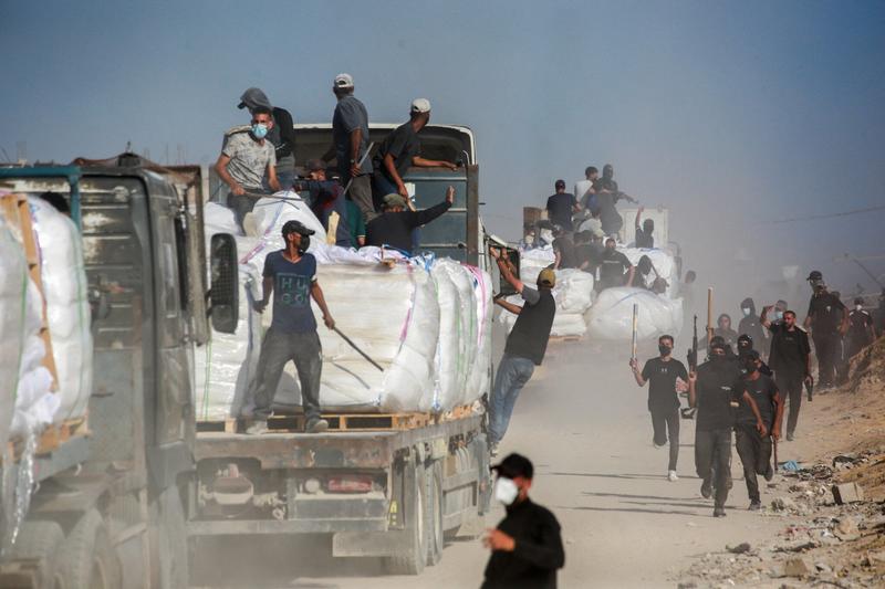 Gaza clans deny Hamas is stealing aid, after Israel partially halts deliveries