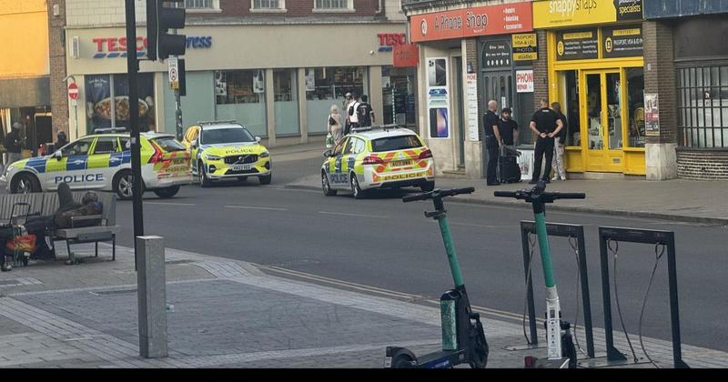 Police swarm city centre street after reports of brawl 'in progress'