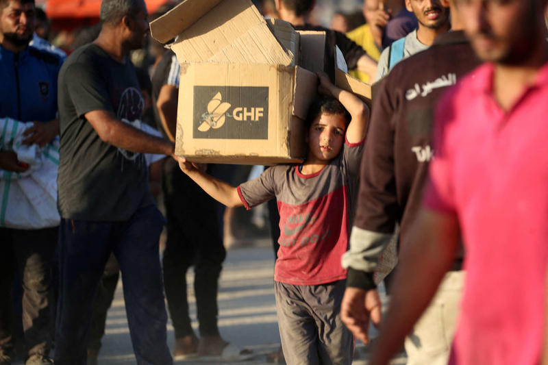 Witnesses Say American Military Contractors Shot Tear Gas at Gaza Aid Seekers