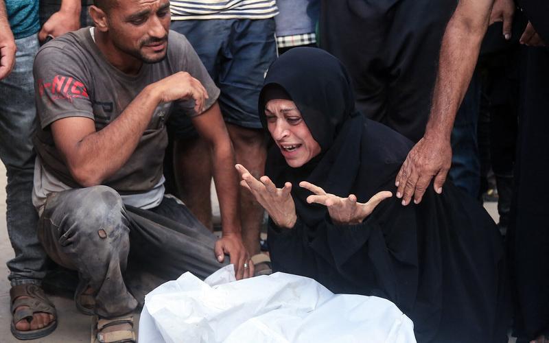 Palestinians say at least 26 killed near Gaza aid sites; IDF says troops fired warning shots