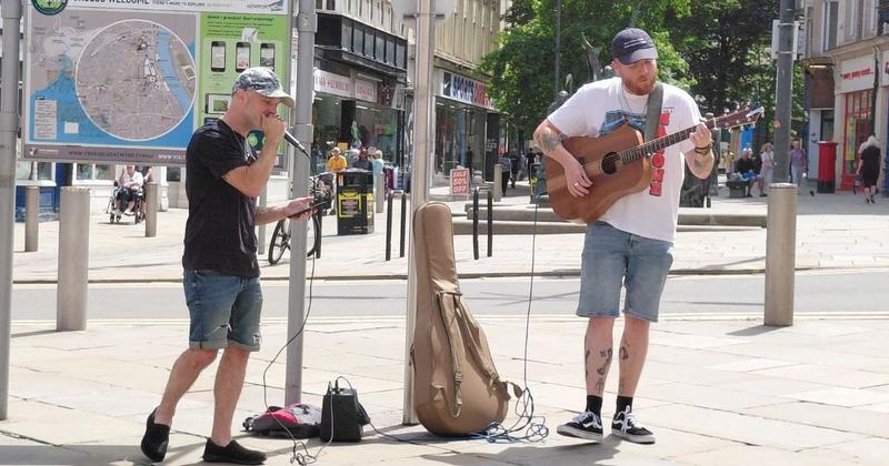 WATCH: Buskers perform at their own designated 'busk stops' in city centre