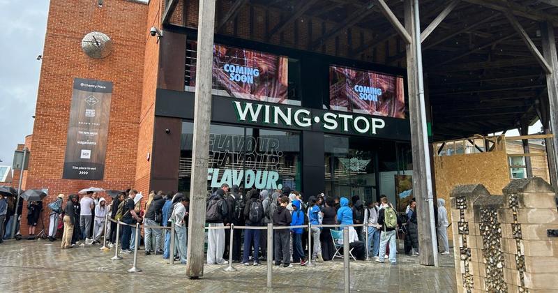 Hundreds queue from 5am in torrential rain for opening of new restaurant