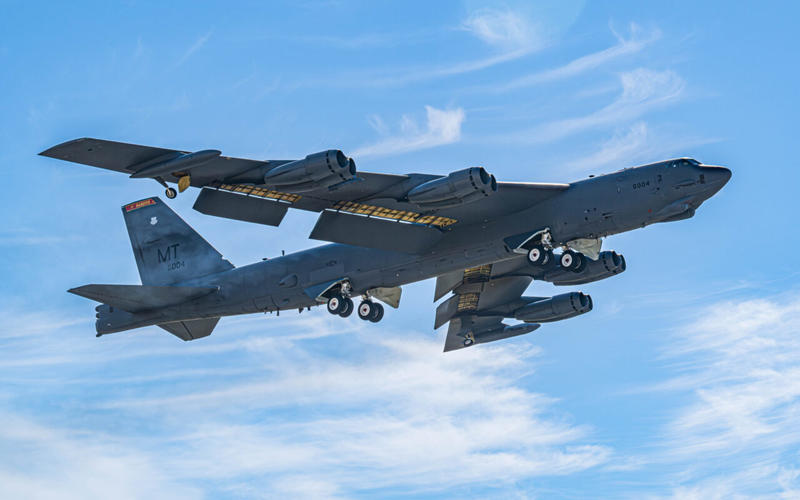 An Air Force B-52 Nearly Collides with a Civilian Airliner