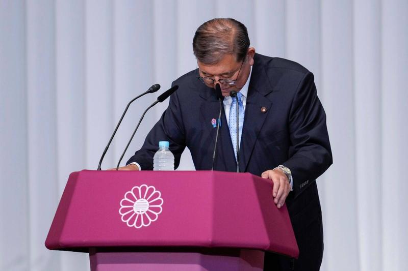 ‘Mr. Japan’ bends the knee — and falls on his sword