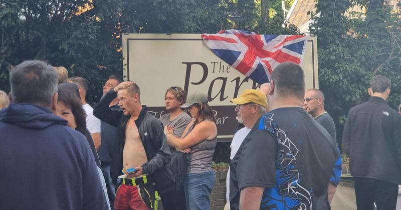 Shock twist in migrant row as hotel says it WON'T accept single male asylum seekers