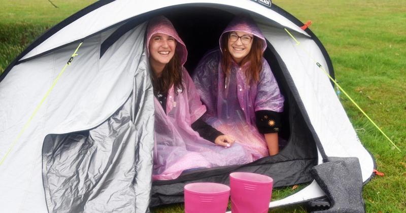 First campers arrive at Latitude Festival in torrential downpours
