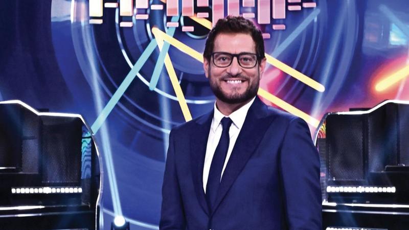 Gerry Scotti, Enrico Papi e le sperimentazioni di Mediaset