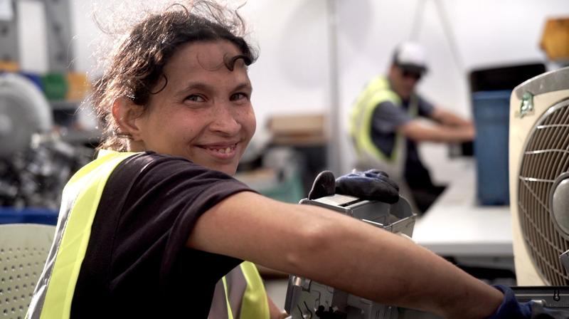 Israelis with disabilities help the environment and themselves at unique recycling hub