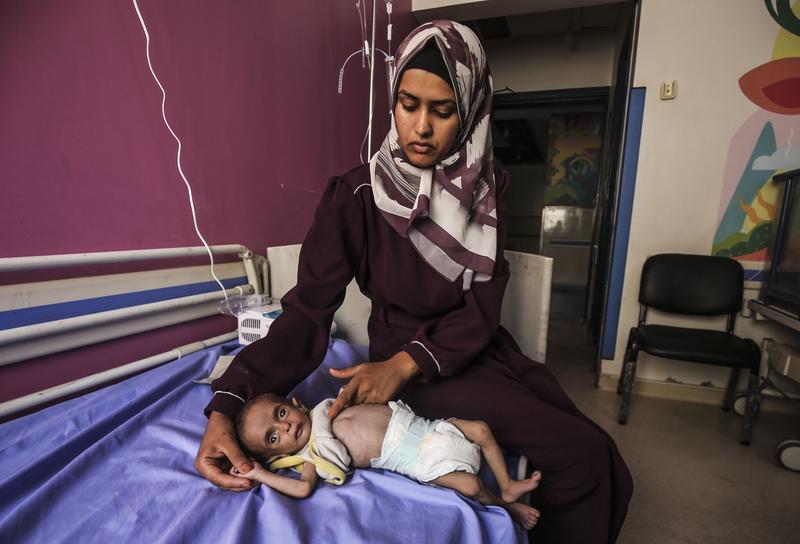 Israel accuses UN of failing to pick up aid in Gaza, says working to ease its entry