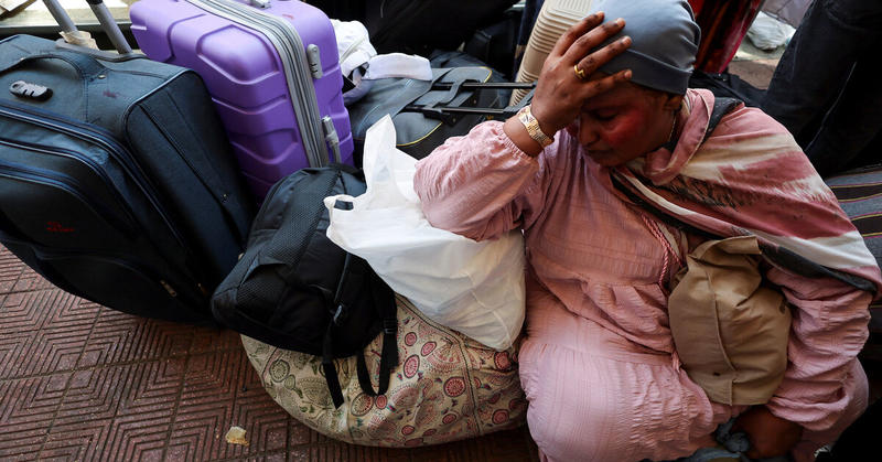 Displaced Sudanese stream home from Egypt after army retakes Khartoum