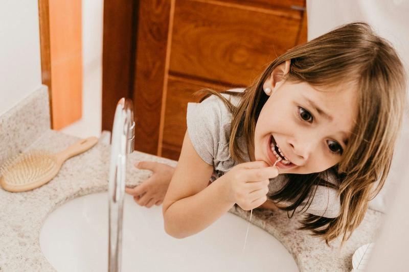 Kids need to floss too, even their baby teeth. But how do you actually get them to do it?