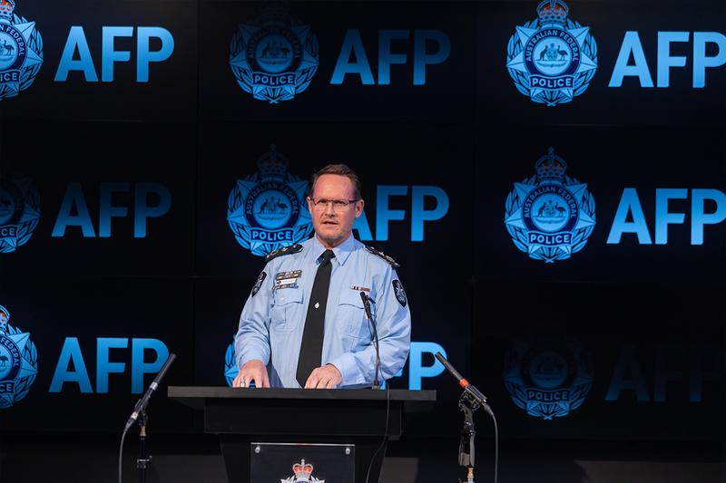 Chinese national accused under foreign interference law of spying on Buddists