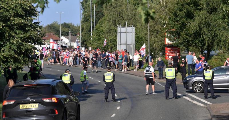Protestors in tense stand-off as asylum hotel row reaches flashpoint