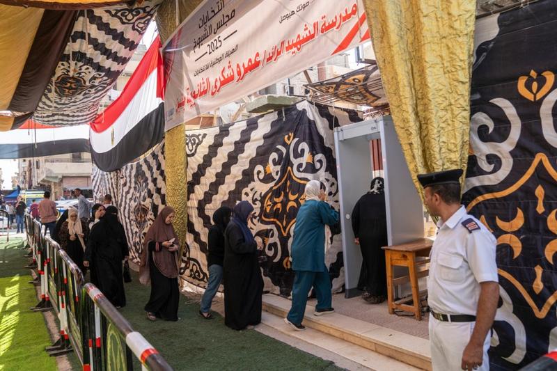 Why Are Egyptians Dancing Outside Polling Stations?