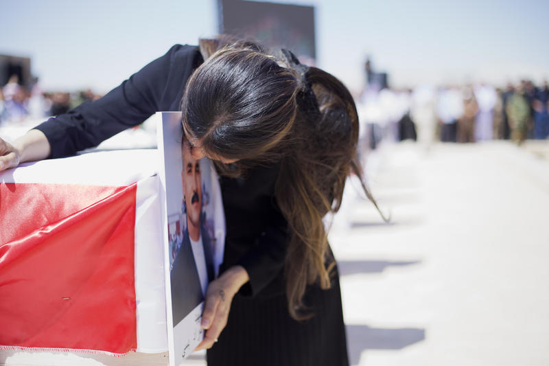 Returning to Iraq to Bury My Brothers