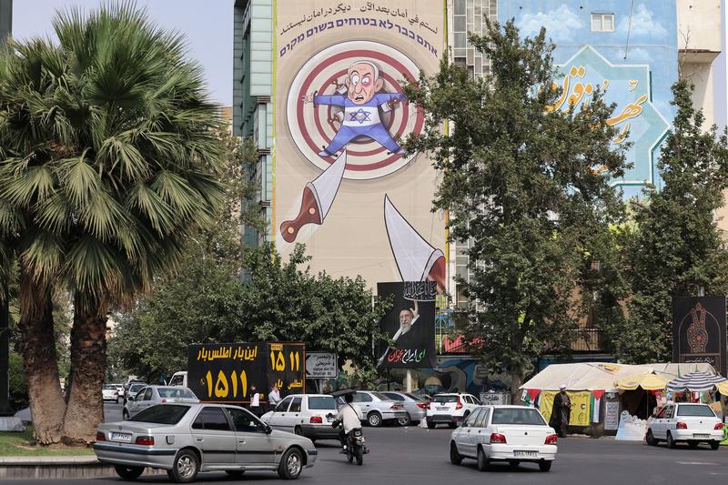 Reeling from war with Israel, Iran at crossroads between defiance and diplomacy