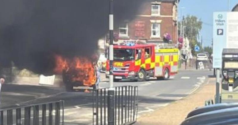 Camper van blaze shuts busy road for nearly two hours