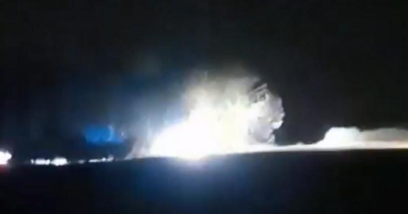 Firefighters tackle field blaze after reports it was sparked by fireworks display