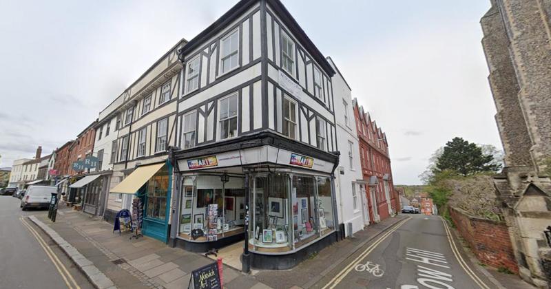 Building on one of city's poshest streets to go under the hammer