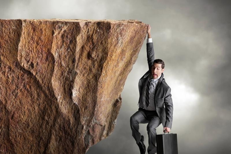 'Holding on for Dear Life': What's Behind the 'Job Hugging' Trend That's Stagnating Your Career
