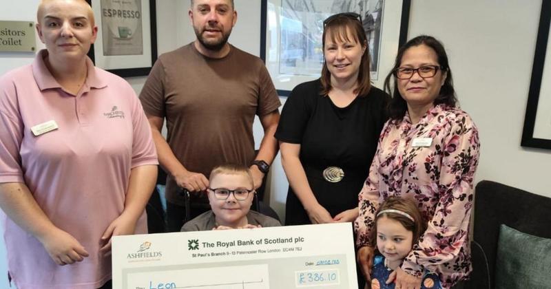 Care home donates cheque to Norfolk boy with deadly disease