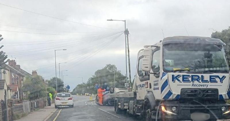 Man arrested on suspicion of drink-driving after car overturns