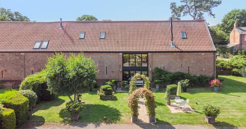 Converted barn overlooking countryside for sale at £895,000