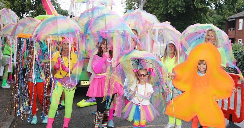 Crowds pack streets as town's carnival parade returns with new route