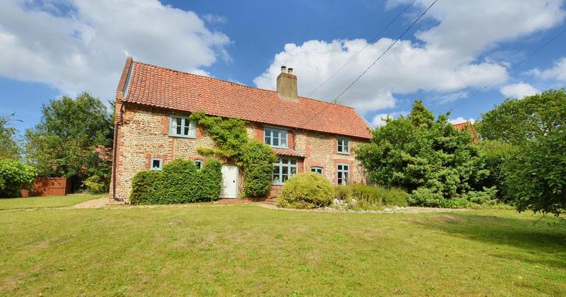 Grade II listed cottage for sale near Holt at £595,000