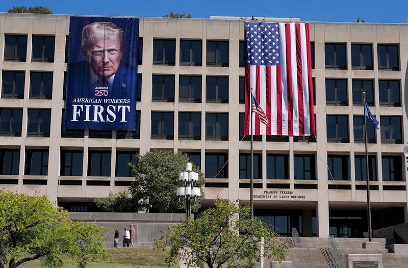 Trump Pulls From Dictator Playbook and Hangs Giant Banner of His Face
