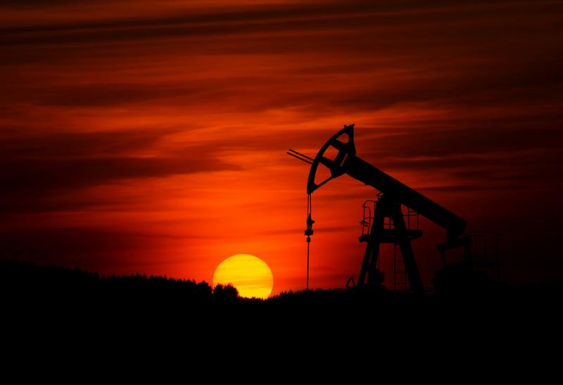 Oil Giants Retreat from Clean Energy at Their Own Peril