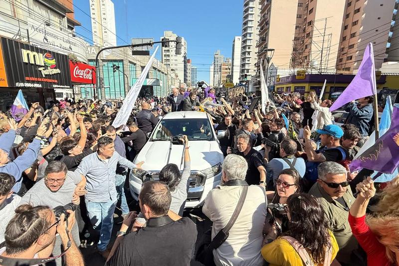 Two arrested after Milei evacuated from campaign parade chaos