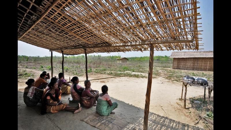 Measuring land with red tape