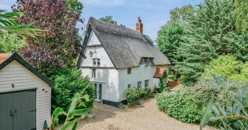 Thatched cottage with period features for sale at almost £650,000