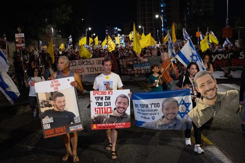 Suspended in hellish limbo, families of hostages declared dead fight to not be forsaken