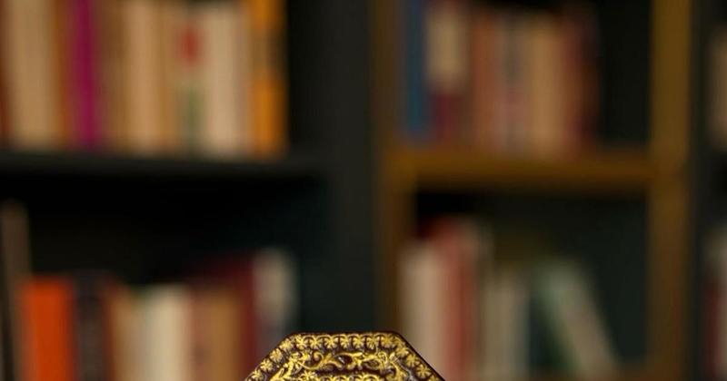 Miniature Qur'an kept in Norfolk dolls' house to be sold at auction