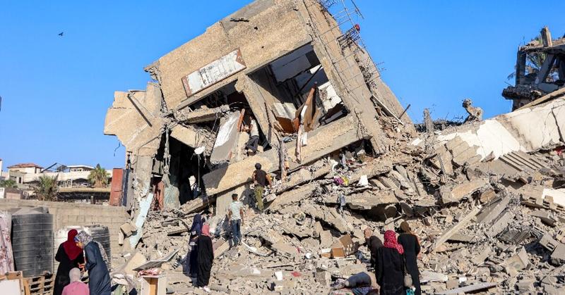 'World watches our slaughter': Gazans flee Israeli assault on urban hub