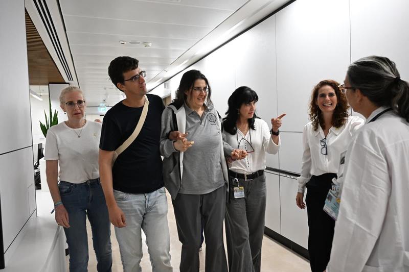 Struggling to walk, Elizabeth Tsurkov embraces loved ones after return to Israel from captivity